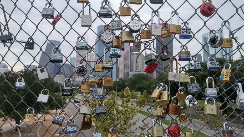 Photo of locks on a gate in Houston, Texas.