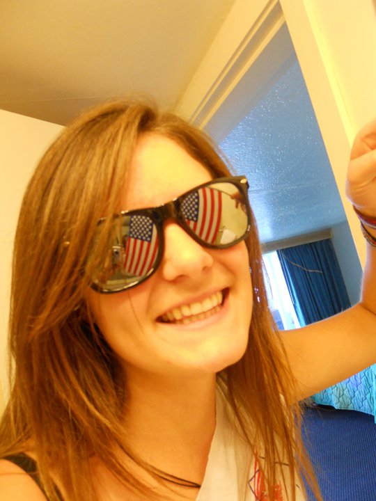 PHoto of me with american flag reflected in my sunglasses.